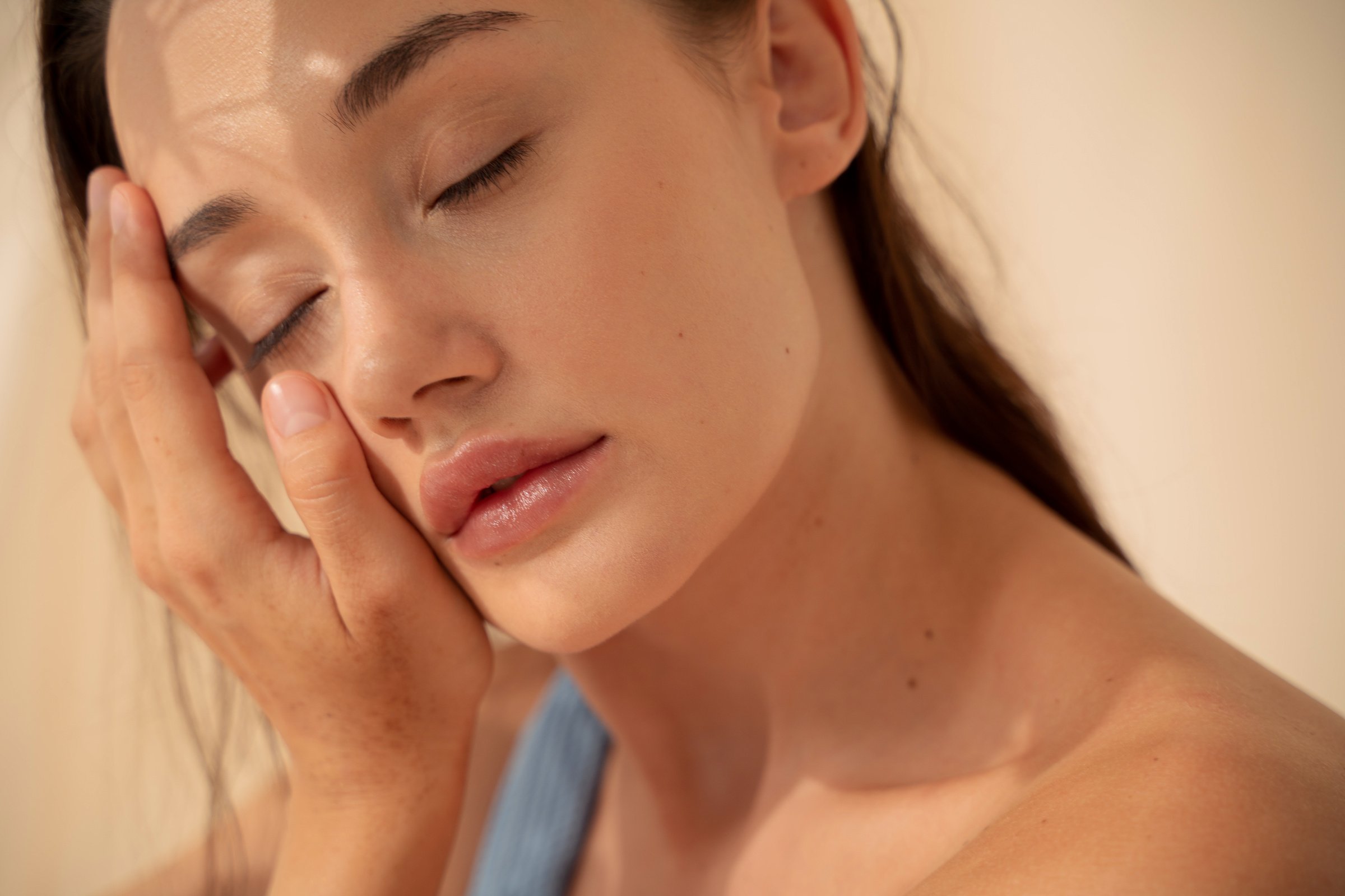 Woman Touching Her Face